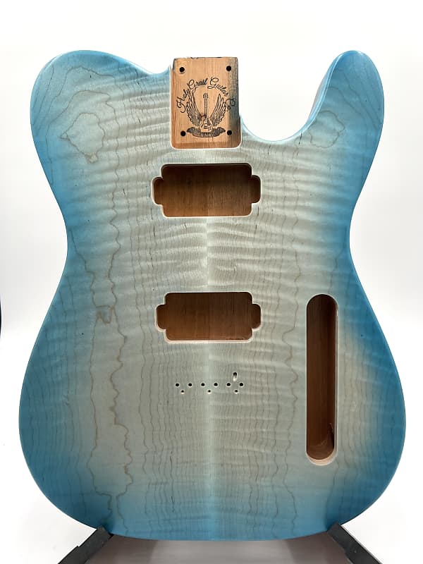 Beautiful flamed maple burst on a Honduran Mahogany back, finished in a satin finish