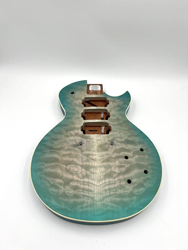 Warmoth Regal Custom 7a Quilt Maple Mahogany Back