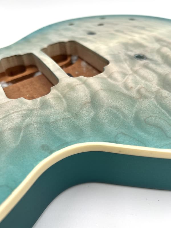 Warmoth Regal Custom 7a Quilt Maple Mahogany Back