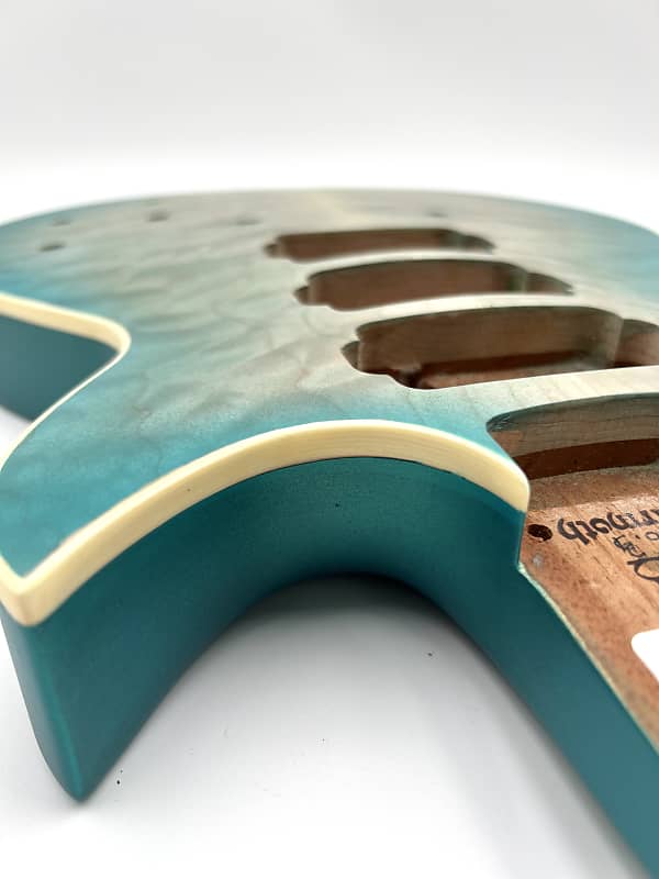 Warmoth Regal Custom 7a Quilt Maple Mahogany Back