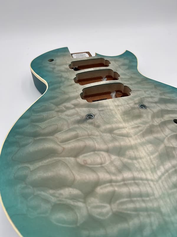 Warmoth Regal Custom 7a Quilt Maple Mahogany Back