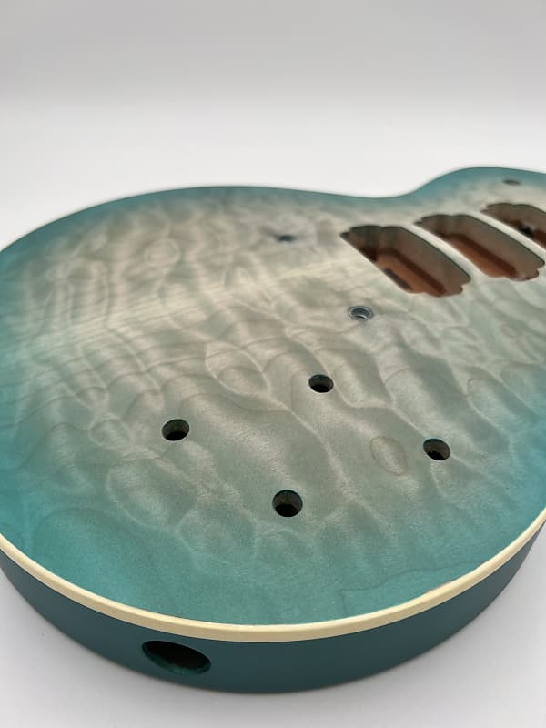 Warmoth Regal Custom 7a Quilt Maple Mahogany Back