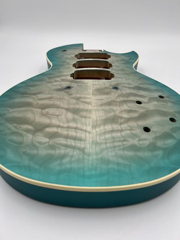 Warmoth Regal Custom 7a Quilt Maple Mahogany Back