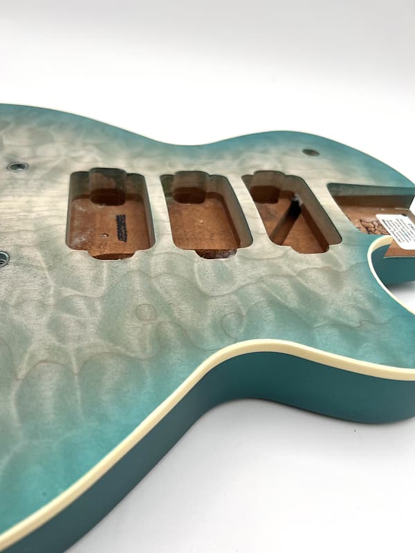 Warmoth Regal Custom 7a Quilt Maple Mahogany Back
