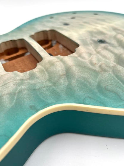 Warmoth Regal Custom 7a Quilt Maple Mahogany Back